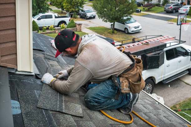 Professional Gutter Repair And Installation technician working in Keezletown, VA
